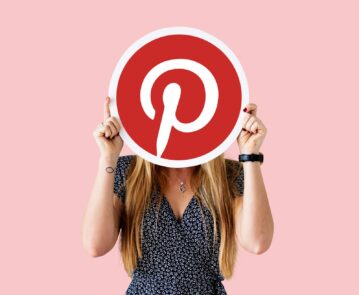 woman-showing-pinterest-icon